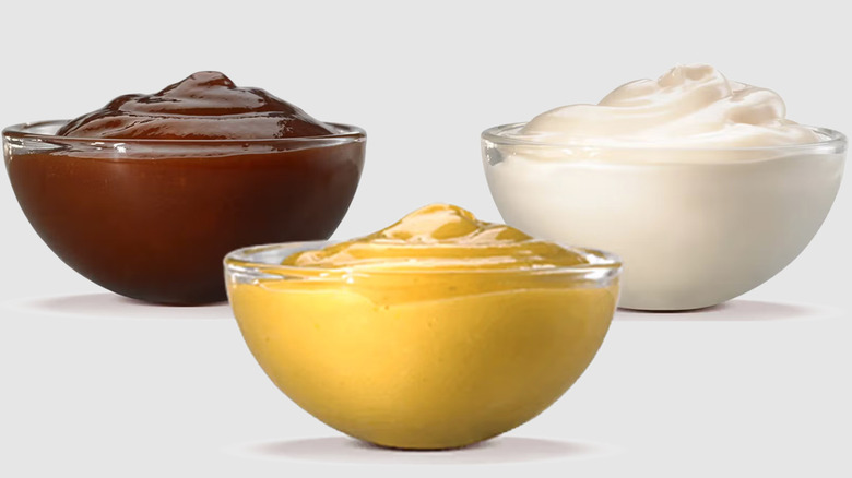 Burger King sauces in glass cups.