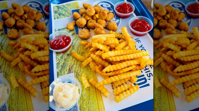 Extra crispy fries from Culver's with cheese curds and dips on tray