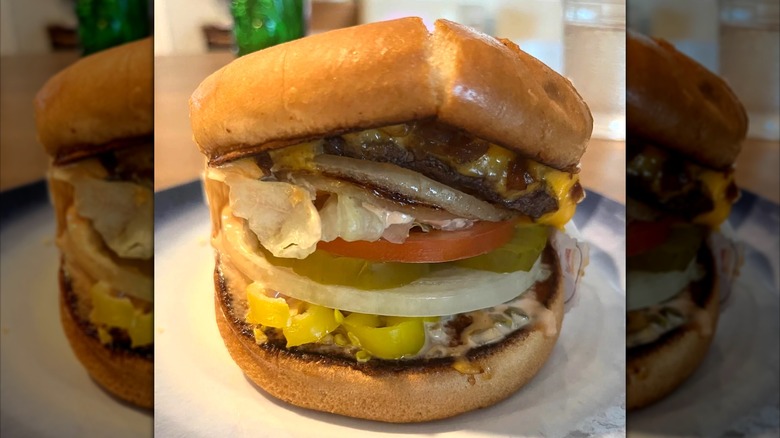 In-N-Out cheeseburger with onions and peppers on extra toasted bun