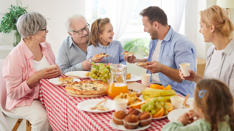 Large family enjoying a meal together