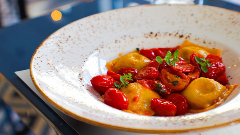 A bowl of ravioli with Corbarino cherry tomatoes
