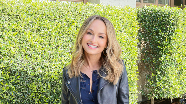 Giada De Laurentiis smiling at the camera outdoors