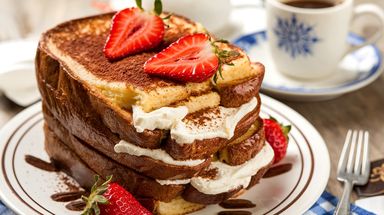 French toast with mascarpone, fruit, and cocoa powder
