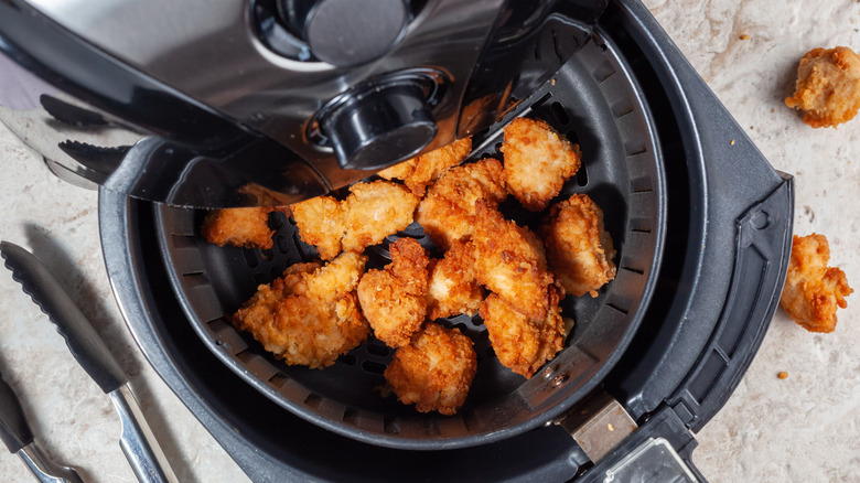 Air fryer with crispy-coated chicken