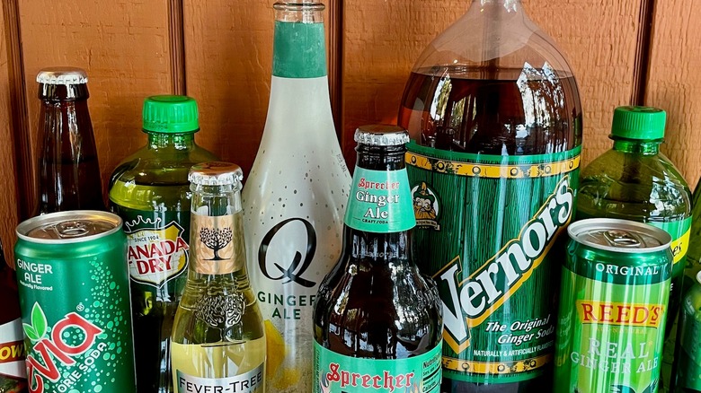 Group of ginger ale bottles cans