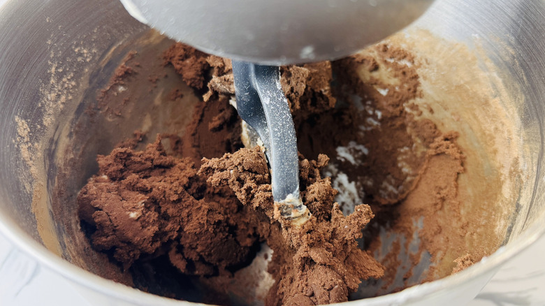 Chocolate cookie dough in mixing bowl