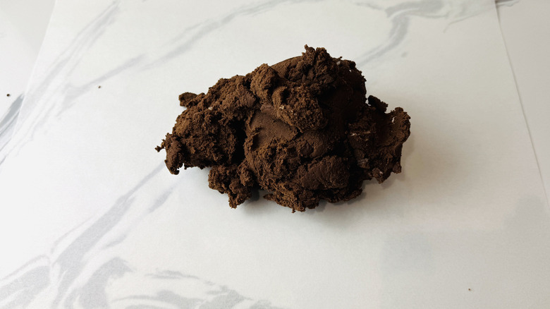Chocolate cookie dough on parchment paper