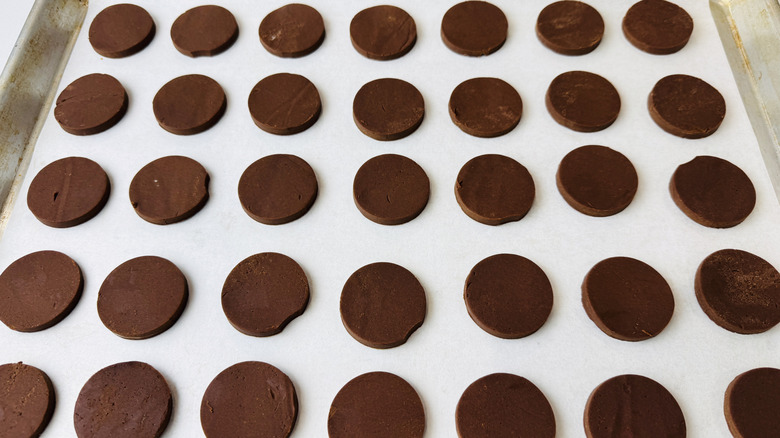 Chocolate cookie dough rounds before baking