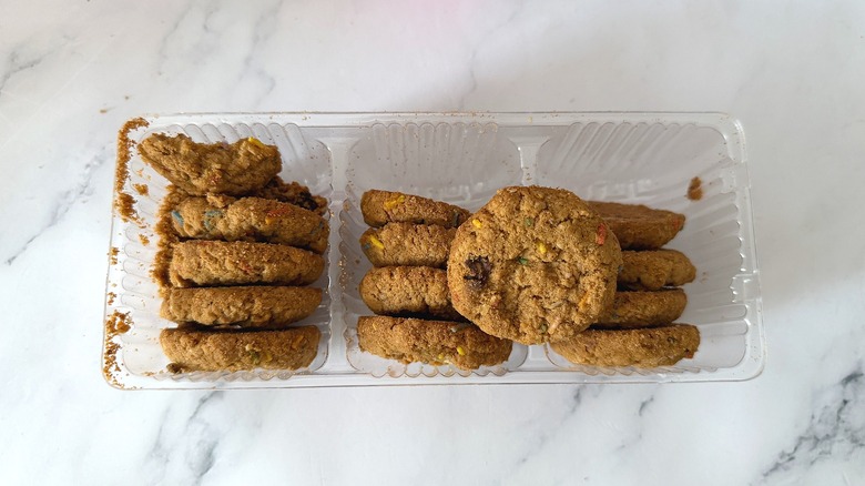 Sparkables Girl Scout Cookies in plastic packaging on marble surface