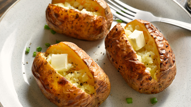 baked potatoes with butter