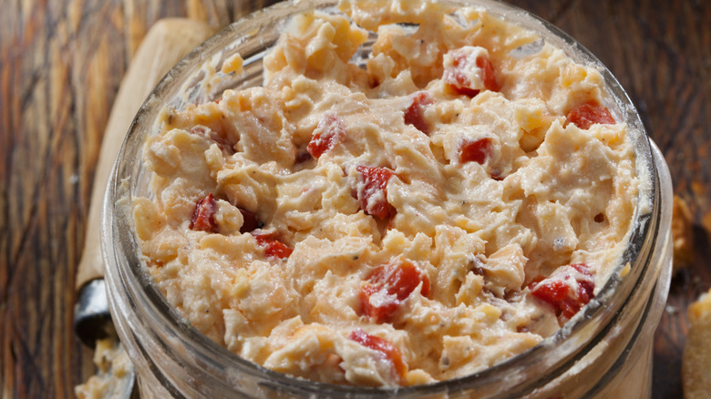 Pimento cheese in a glass jar.