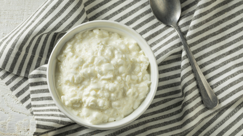 Bowl of cottage cheese with spoon