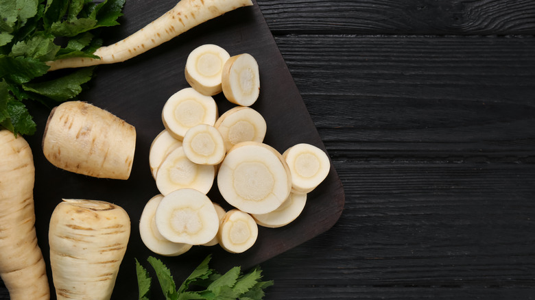 Parsnip sliced on a chopboard