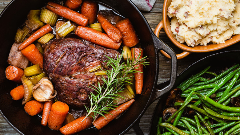 Beef pot roast in a cast iron skillet