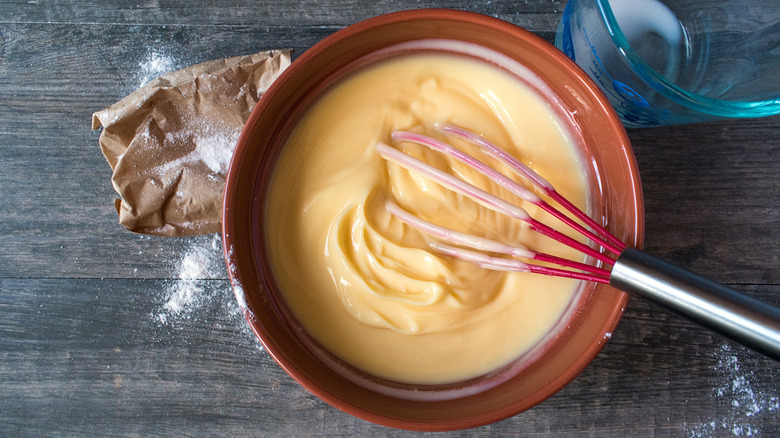 a bowl of vanilla pudding