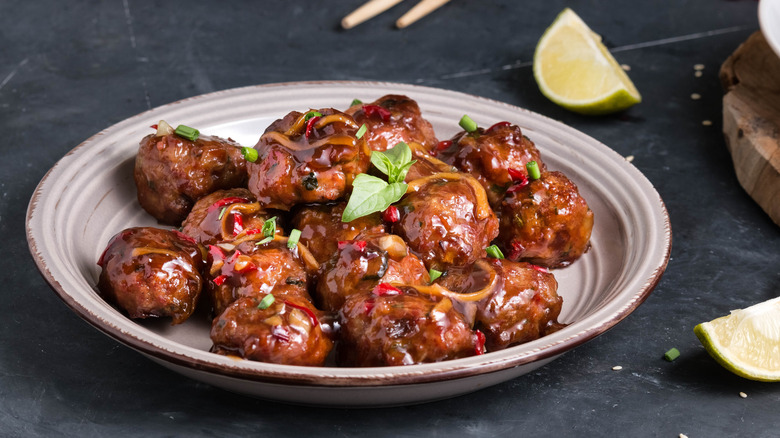 Plate of cocktail meatballs with oyster sauce