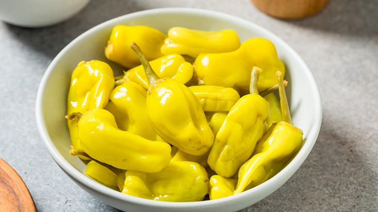 pepperoncini in a white bowl