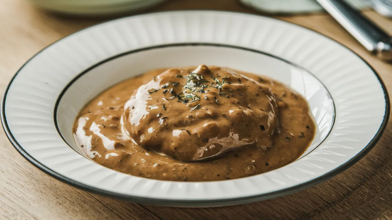 A meat patty smothered in gravy