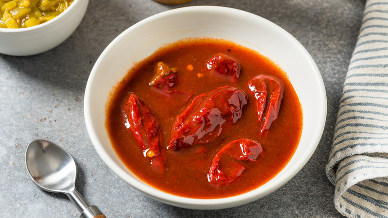 A bowl of chipotle peppers in adobo sauce