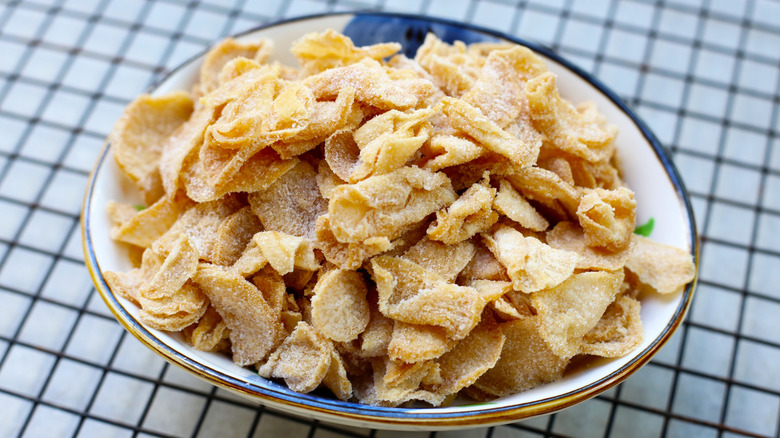 preserved salted radish slices in a wood bowl