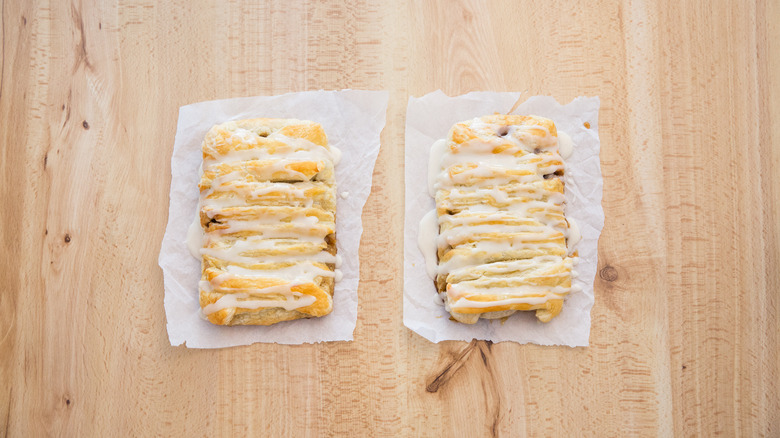 iced pastries on wooden table