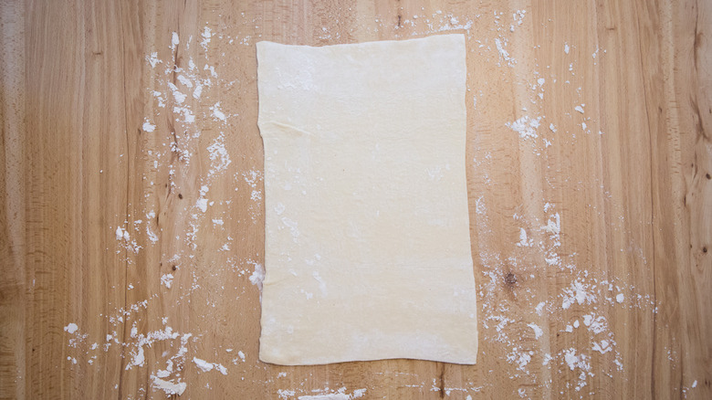 puff pastry on wooden table