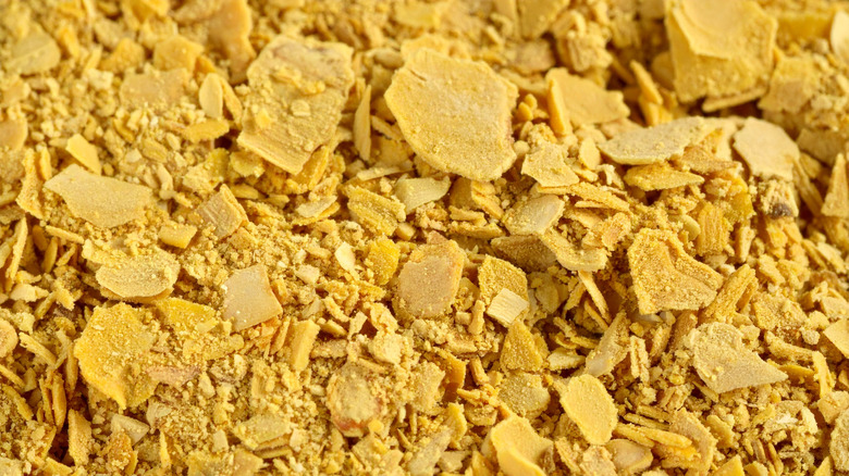 Nutritional yeast flakes as background images