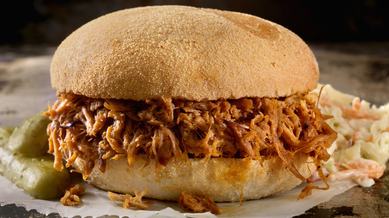 preparing a batch of pulled pork