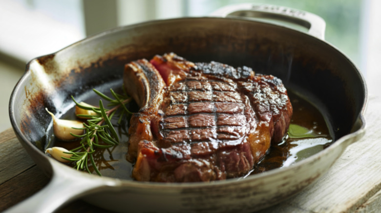 ribeye steak in a pan