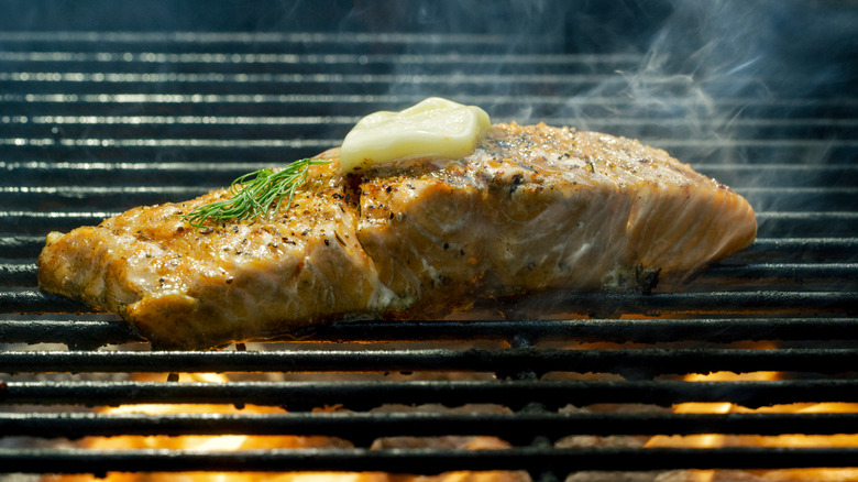 Barbecued salmon fillet with butter on top