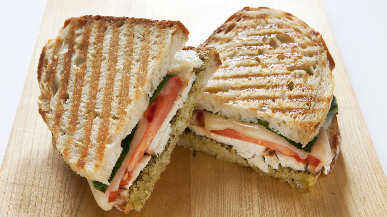 Panini sandwich on a wooden board