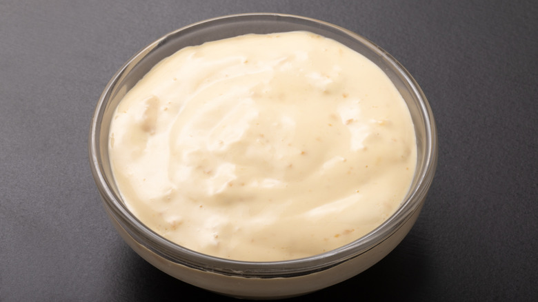 A bowl of miso mayo on a table.