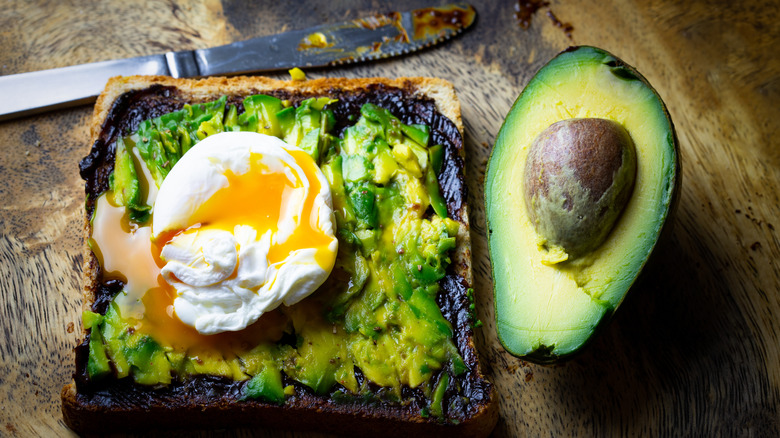 vegemite spread on avocado toast