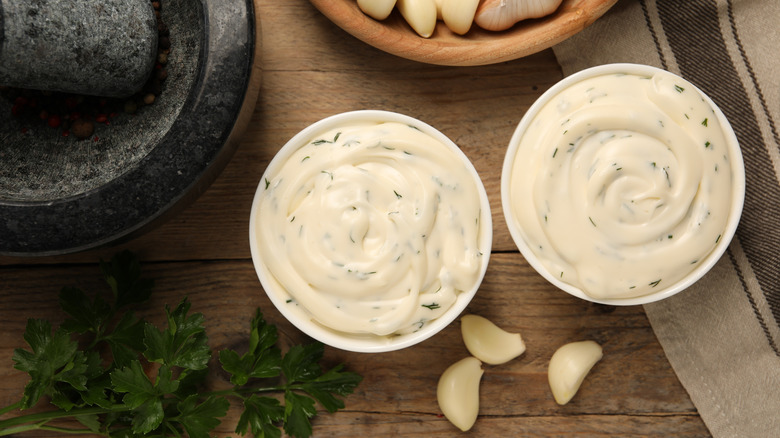 Two bowls of garlic herb mayonnaise