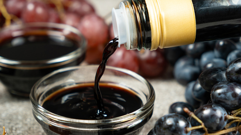 Balsamic vinegar being poured from a bottle