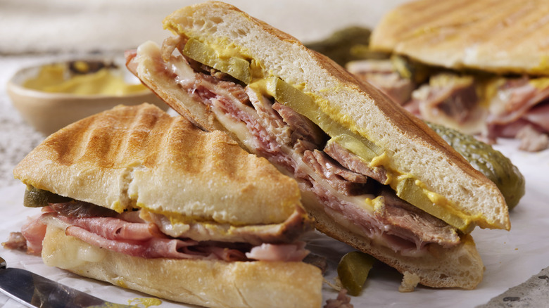 Cuban sandwiches on cutting board 