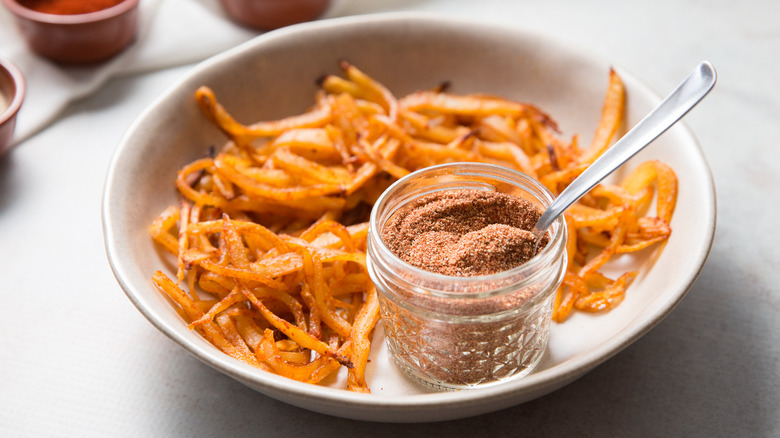 fries and seasoning in bowl