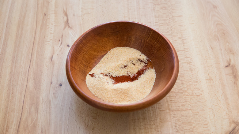 spices in small wooden bowl