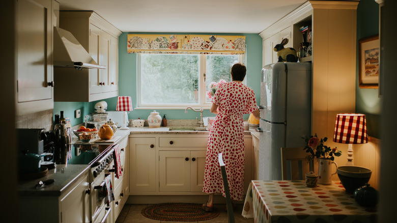 woman in vintage kitchen design
