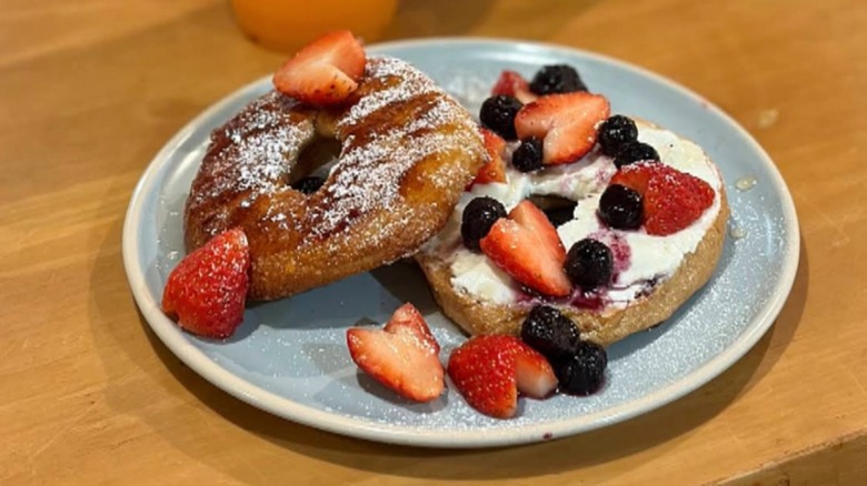 Bagel French toast with berries on plate