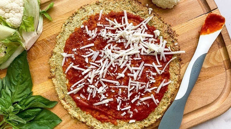 Pizza with sauce and cheese