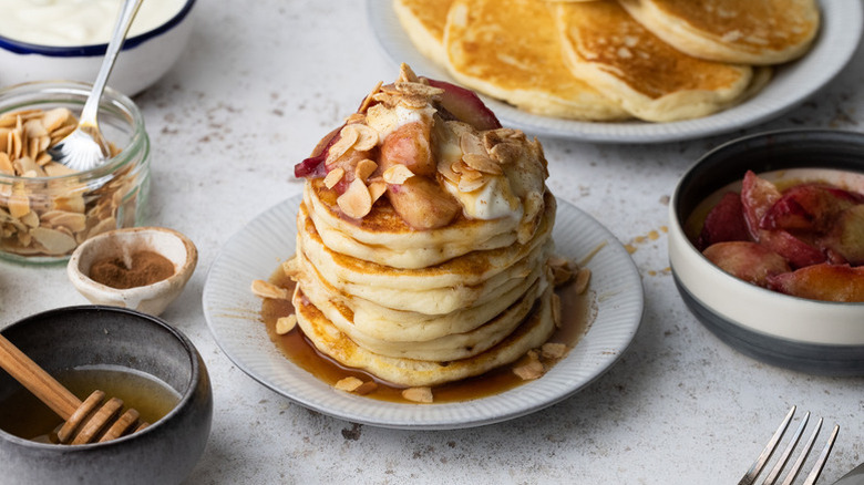 Stack of pancakes with toppings