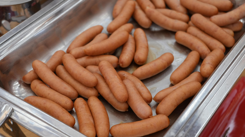 Sausages in a hotel tray