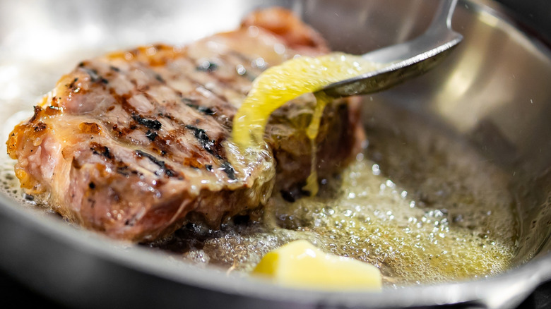 meat and butter in a pan