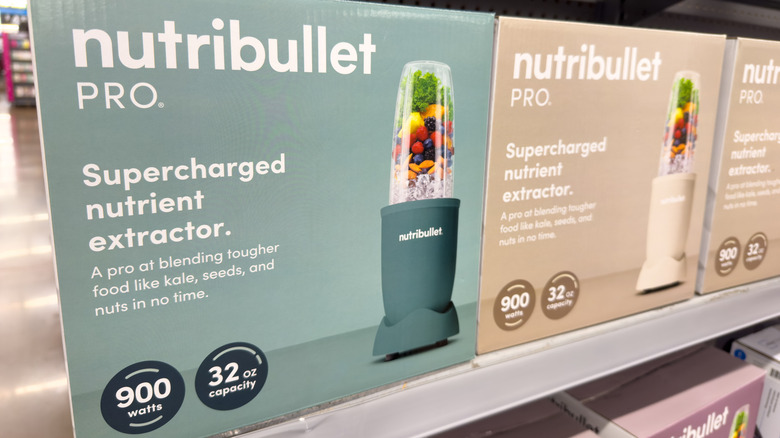 900-watt NutriBullet Pro blenders shown in their boxes on the shelf of a retail store