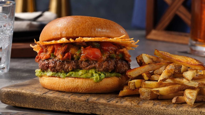 Home Chef and Gordon Ramsay's Inferno Beer Burger and fries on a wooden serving board