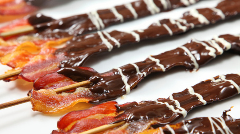 chocolate covered bacon on skewers