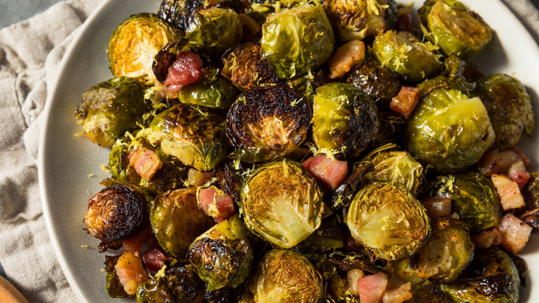 Plate of charred Brussels sprouts with pancetta