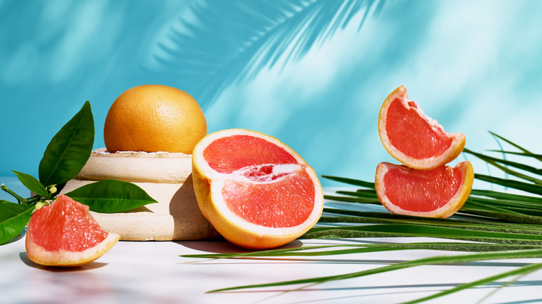 grapefruit with tropical background