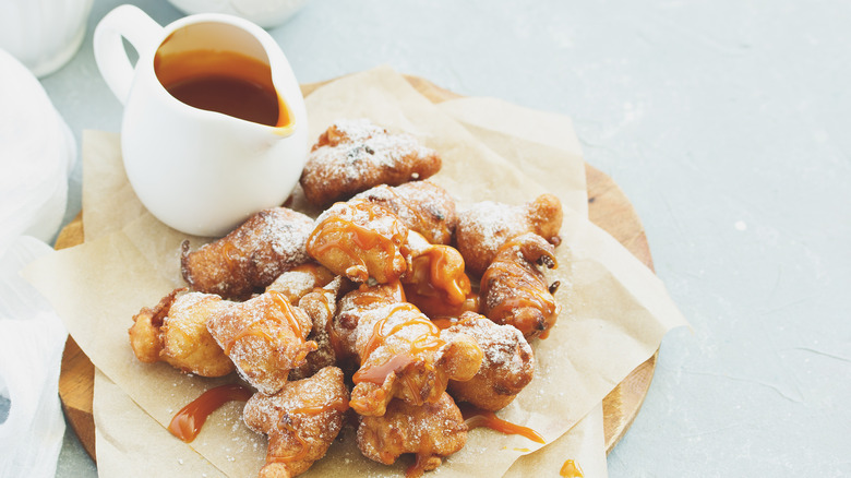 Apple fritters and caramel sauce